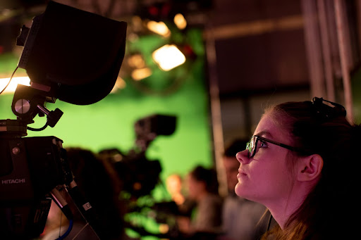 Female student at production camera