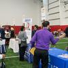 students and employers participating in a job fair on campus.