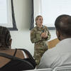 Veteran speaks to group of people at Temple.